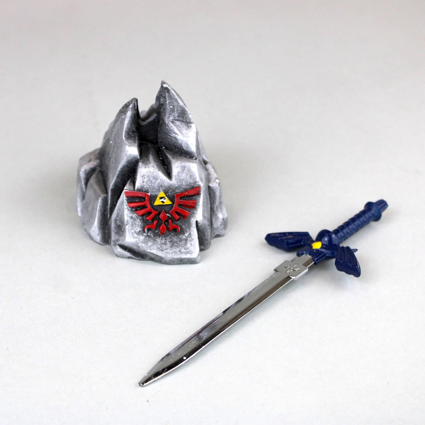 Foam 5.75” The Legend of Master Sword Letter Opener In Stone Display- KD1501BL